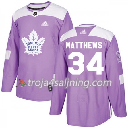 Toronto Maple Leafs tröja Auston Matthews 34 Adidas 2017-2018 Lila Fights Cancer Practice Authentic - NHL Tröjor Herr Toronto Maple Leafs tröja Auston Matthews 34 Adidas 2017-2018 Lila Fights Cancer Practice Authentic - NHL Tröjor Herr